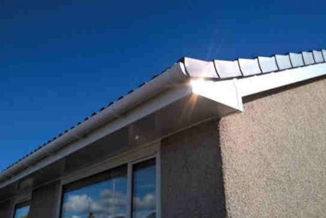 White fascia's, soffit and round guttering.